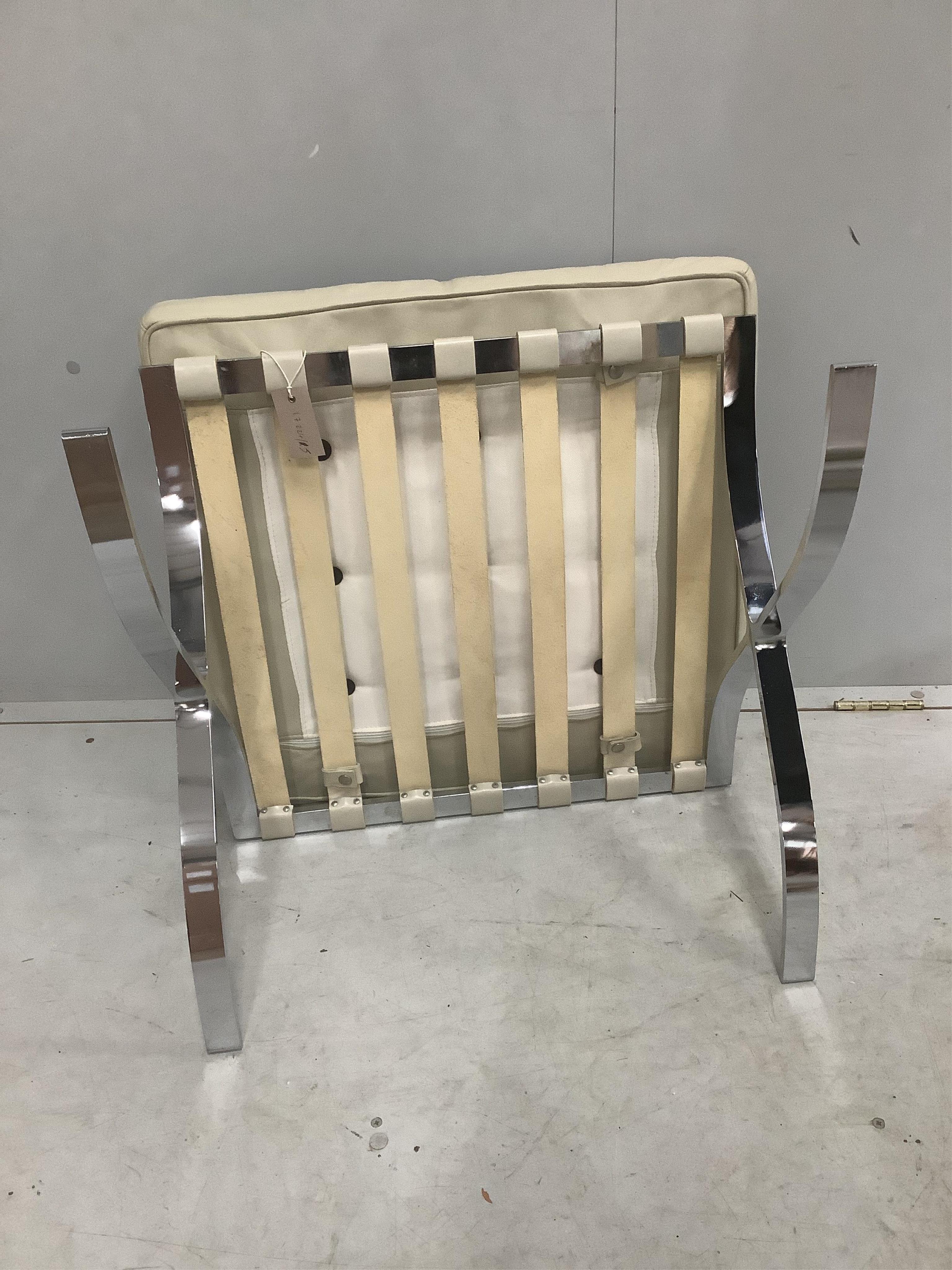 A pair of Barcelona style ivory leather and chrome ottoman stools, width 61cm, depth 58cm, height 36cm. Condition - good